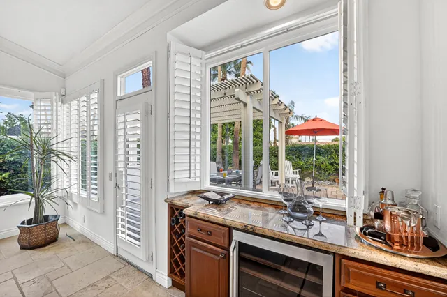 a living room with furniture fireplace and flat screen tv