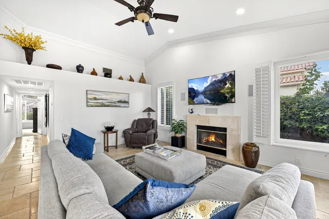 a bed room with a bed and a television