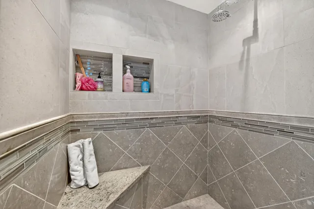 an outdoor space with furniture and umbrella