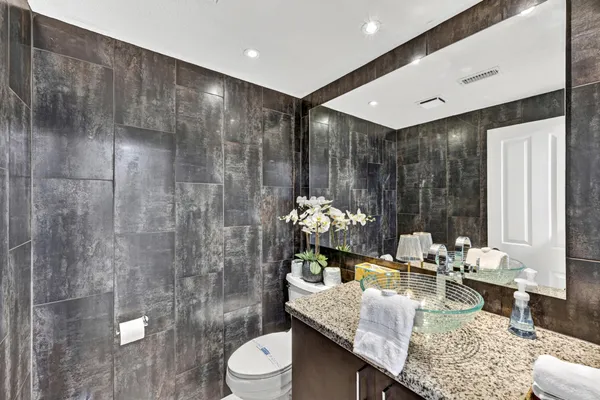 an outdoor space with furniture and umbrella