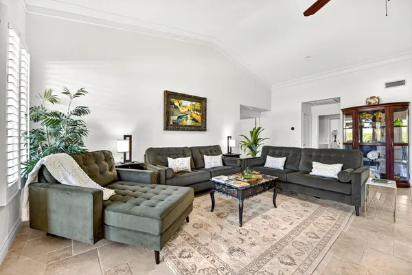 a living room with furniture and a view of living room