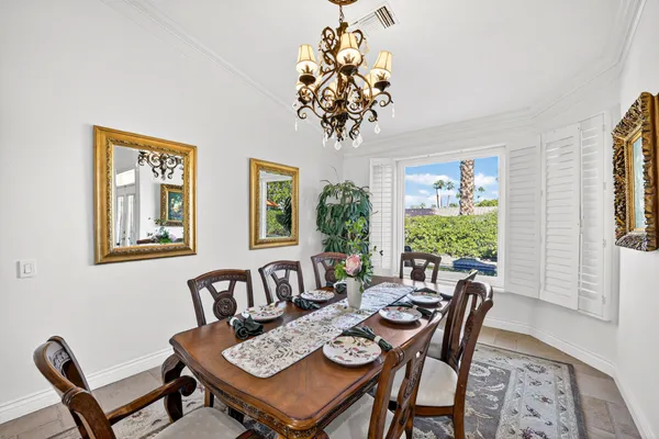 a kitchen with stainless steel appliances granite countertop a sink and a stove