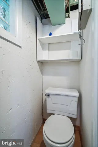 a view of balcony with wooden floor and fence