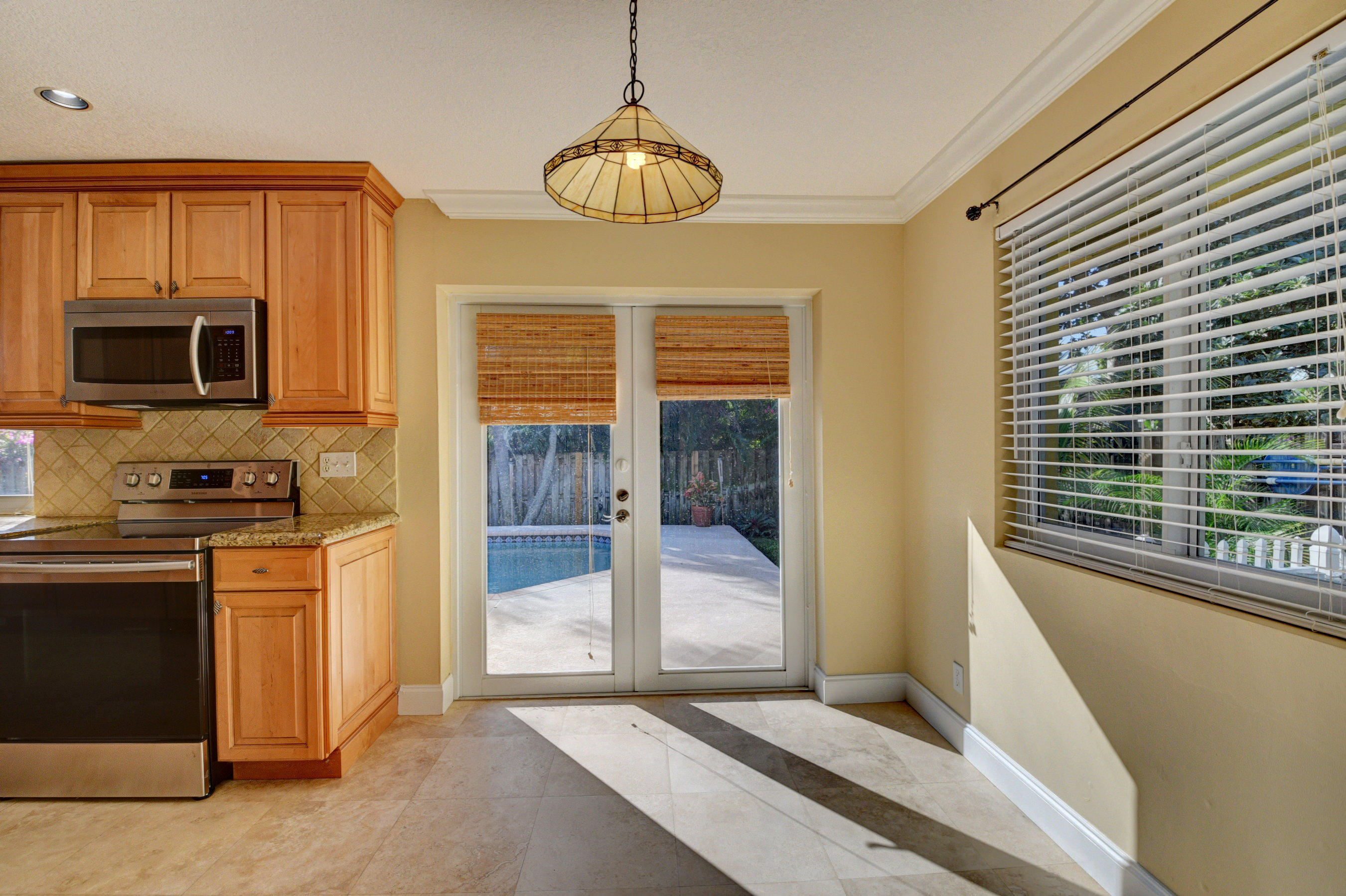 1990 Bonnie Street Boca Raton, FL 33486 - Photo 15 of 28 a view of a kitchen from the kitchen