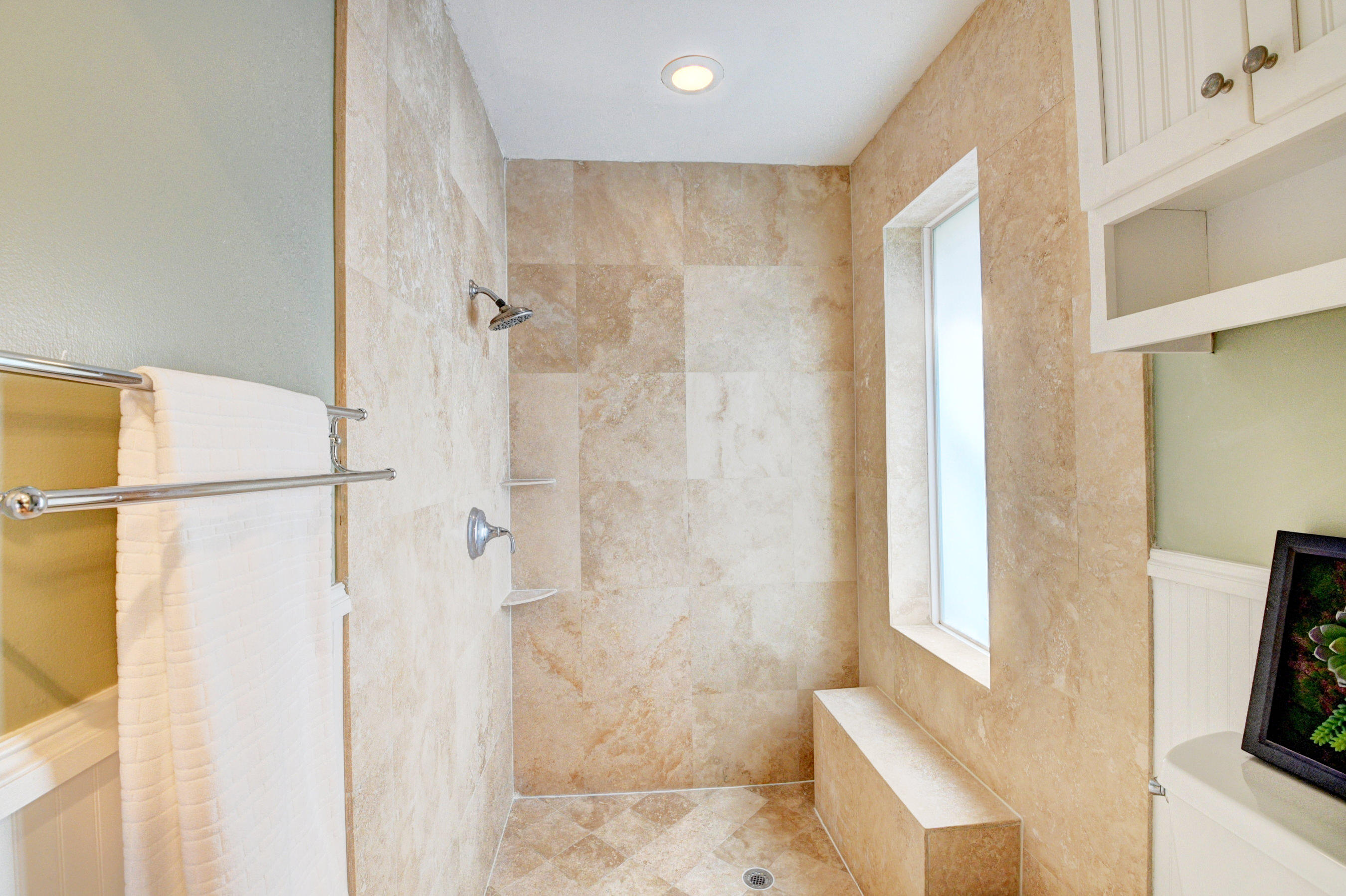 1990 Bonnie Street Boca Raton, FL 33486 - Photo 20 of 28 a bathroom with a shower and a tub
