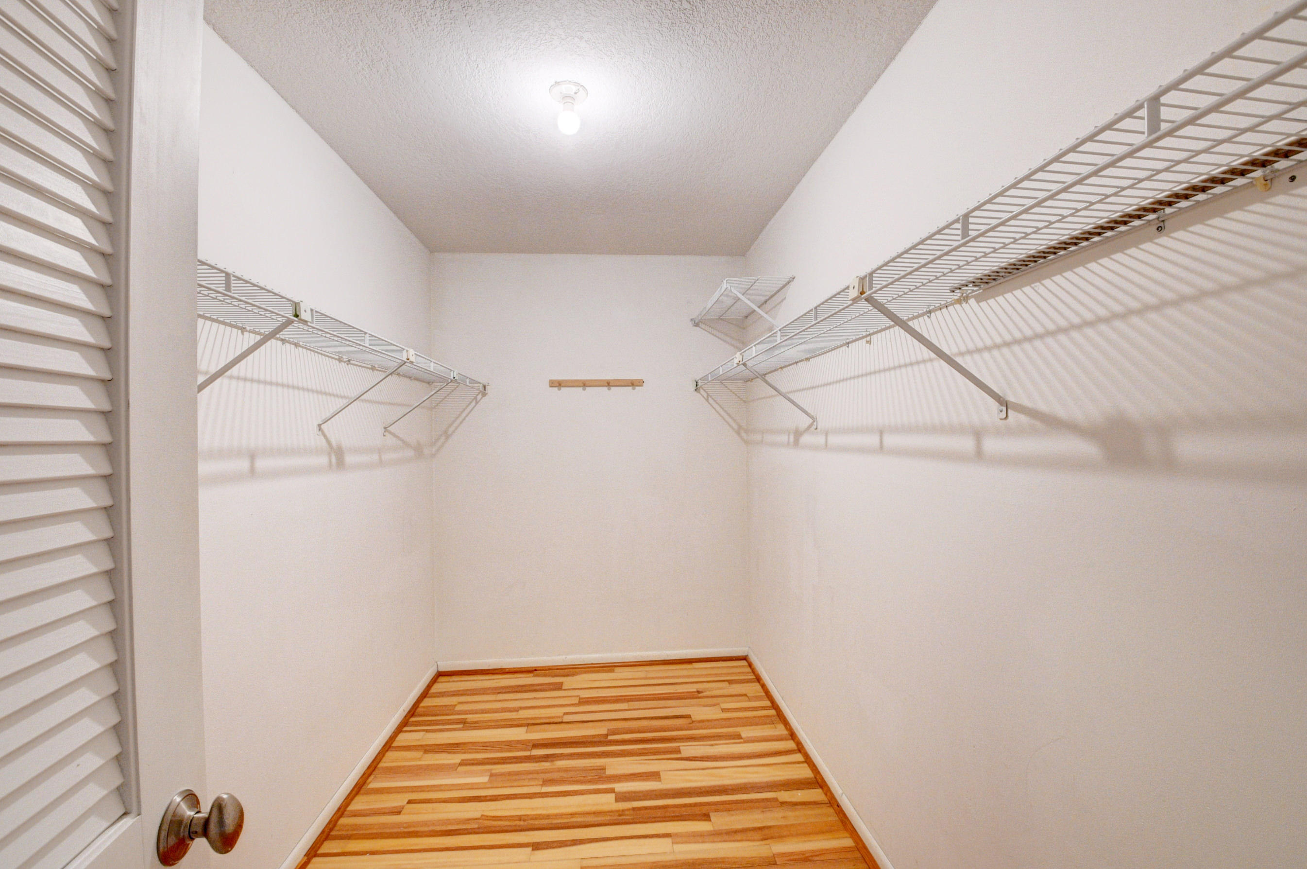1990 Bonnie Street Boca Raton, FL 33486 - Photo 21 of 28 a view of a room with racks on the wall