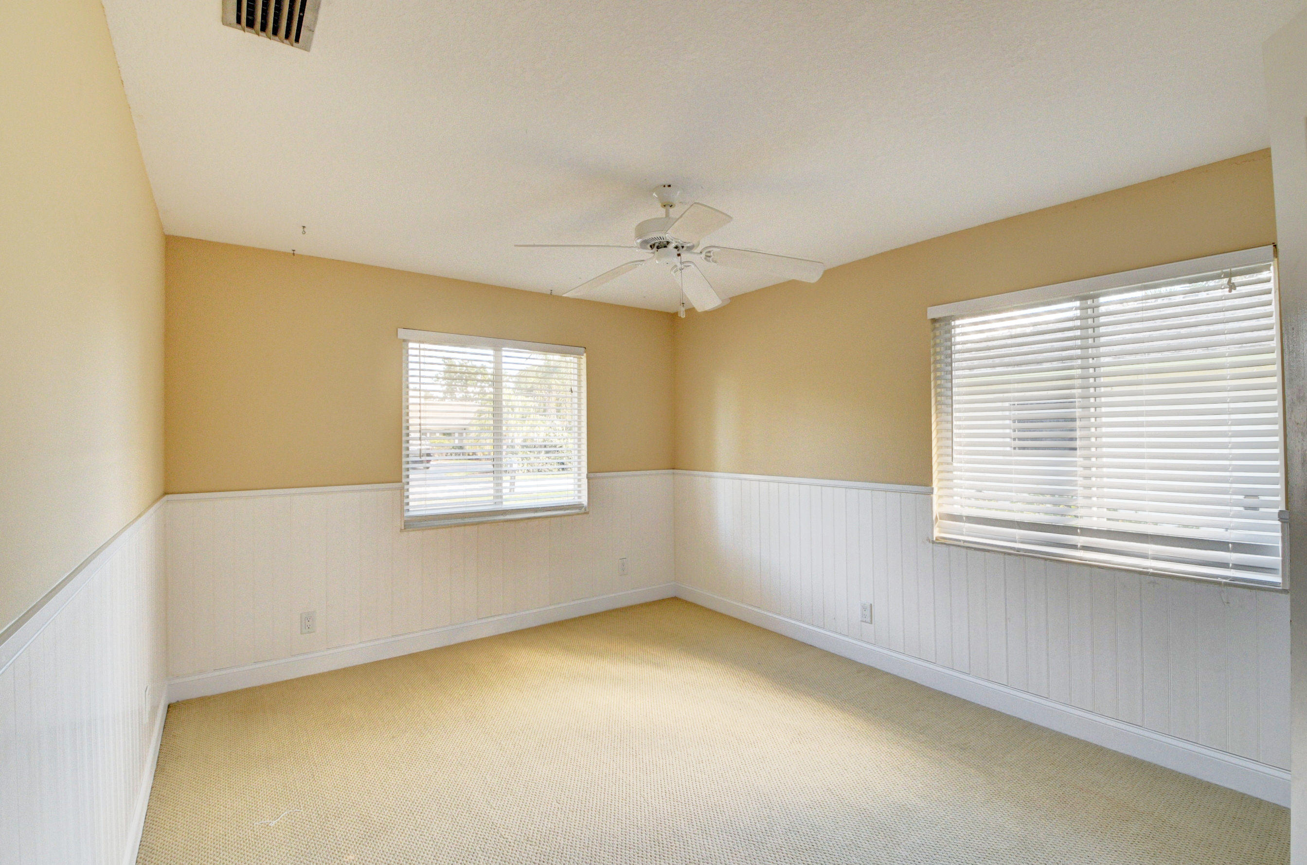 1990 Bonnie Street Boca Raton, FL 33486 - Photo 23 of 28 a view of an empty room with a window