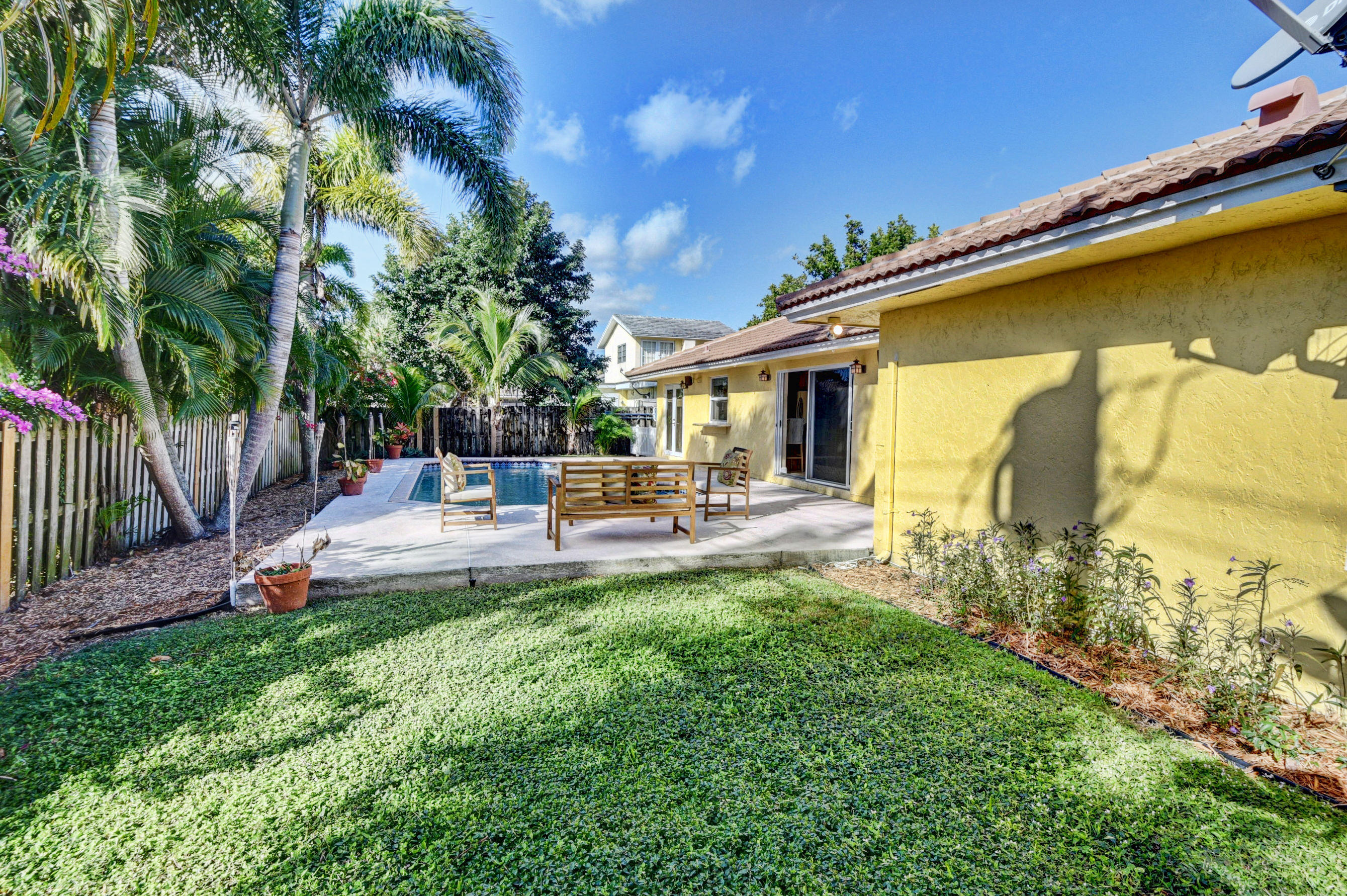 1990 Bonnie Street Boca Raton, FL 33486 - Photo 28 of 28 a garden view with a seating space