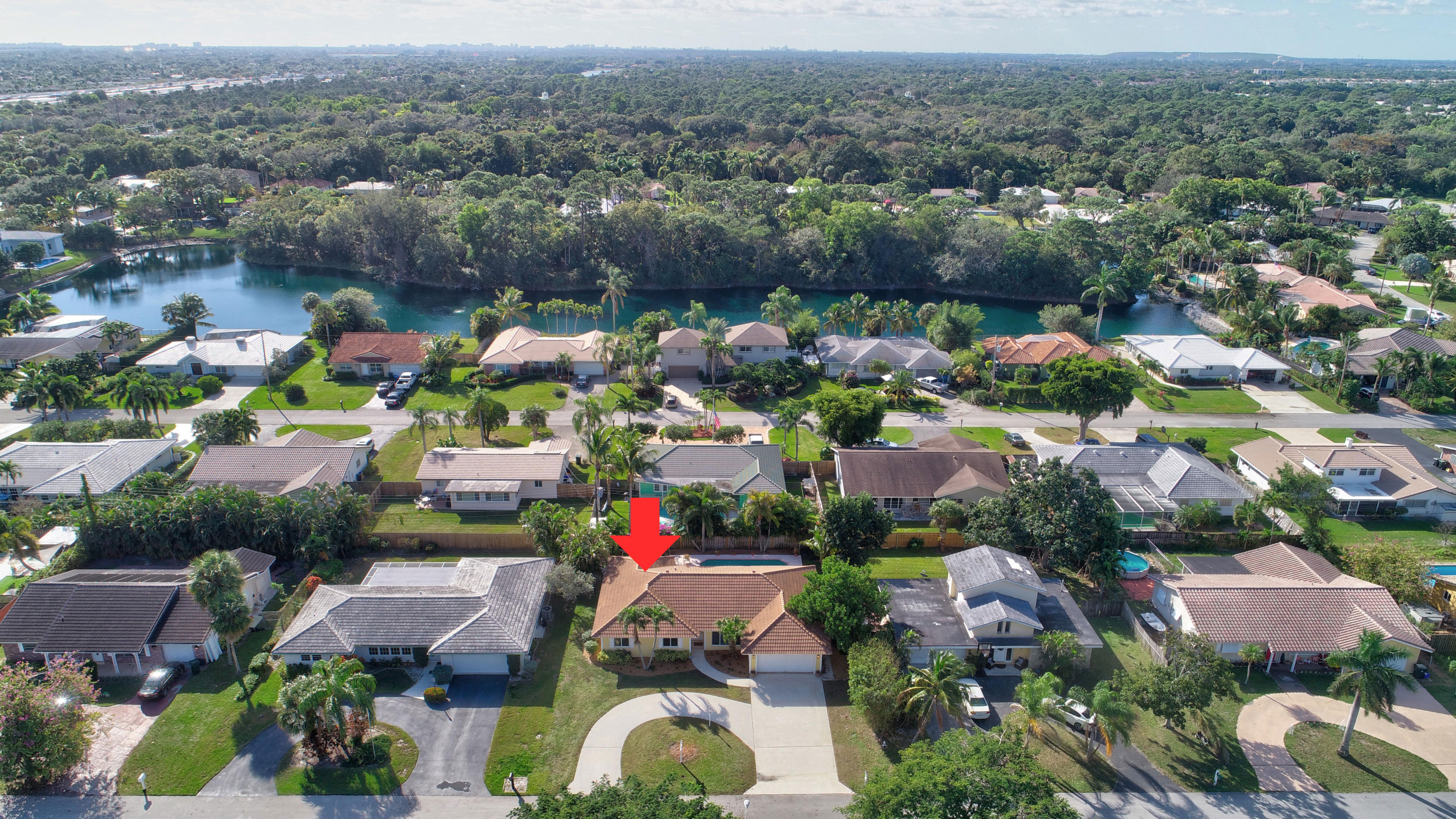 1990 Bonnie Street Boca Raton, FL 33486 - Photo 3 of 28 an aerial view of a houses and city street