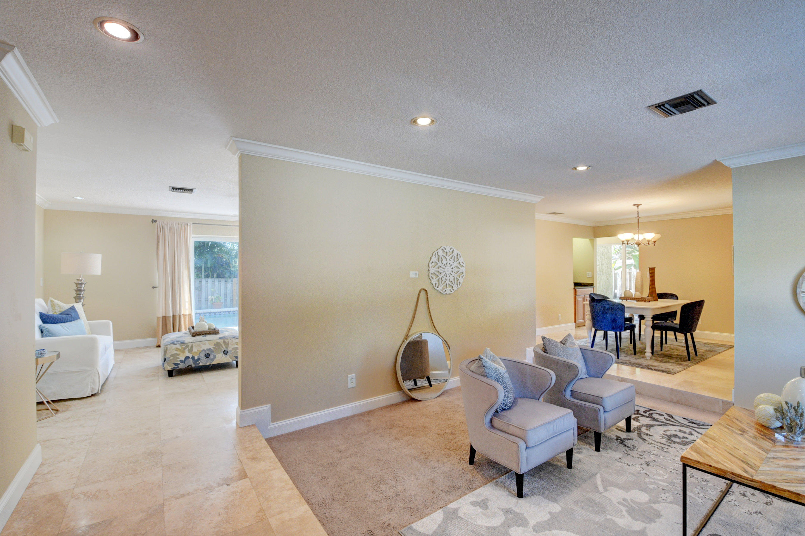 1990 Bonnie Street Boca Raton, FL 33486 - Photo 4 of 28 a living room with furniture and a gym