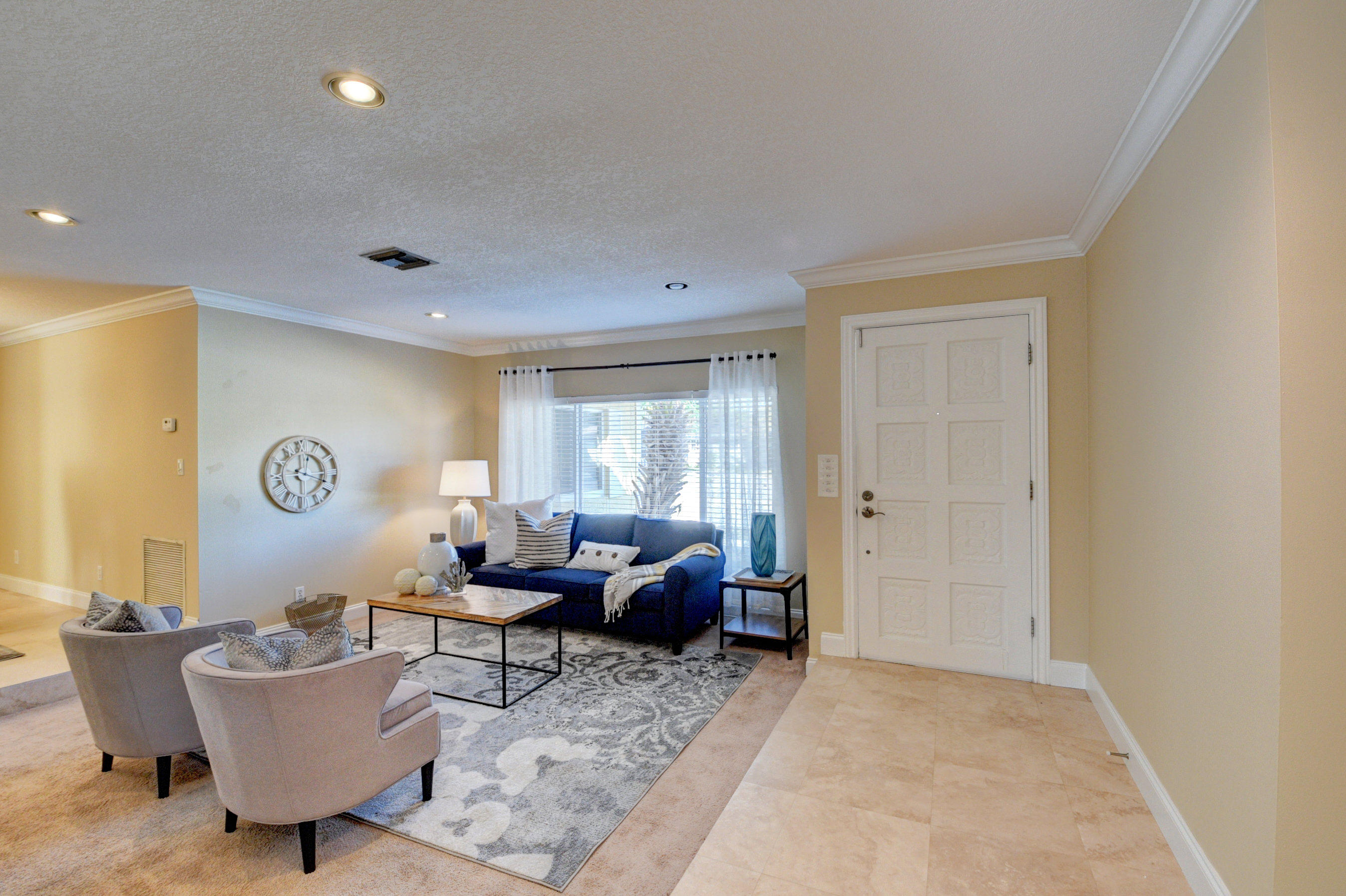 1990 Bonnie Street Boca Raton, FL 33486 - Photo 6 of 28 a living room with furniture and a window