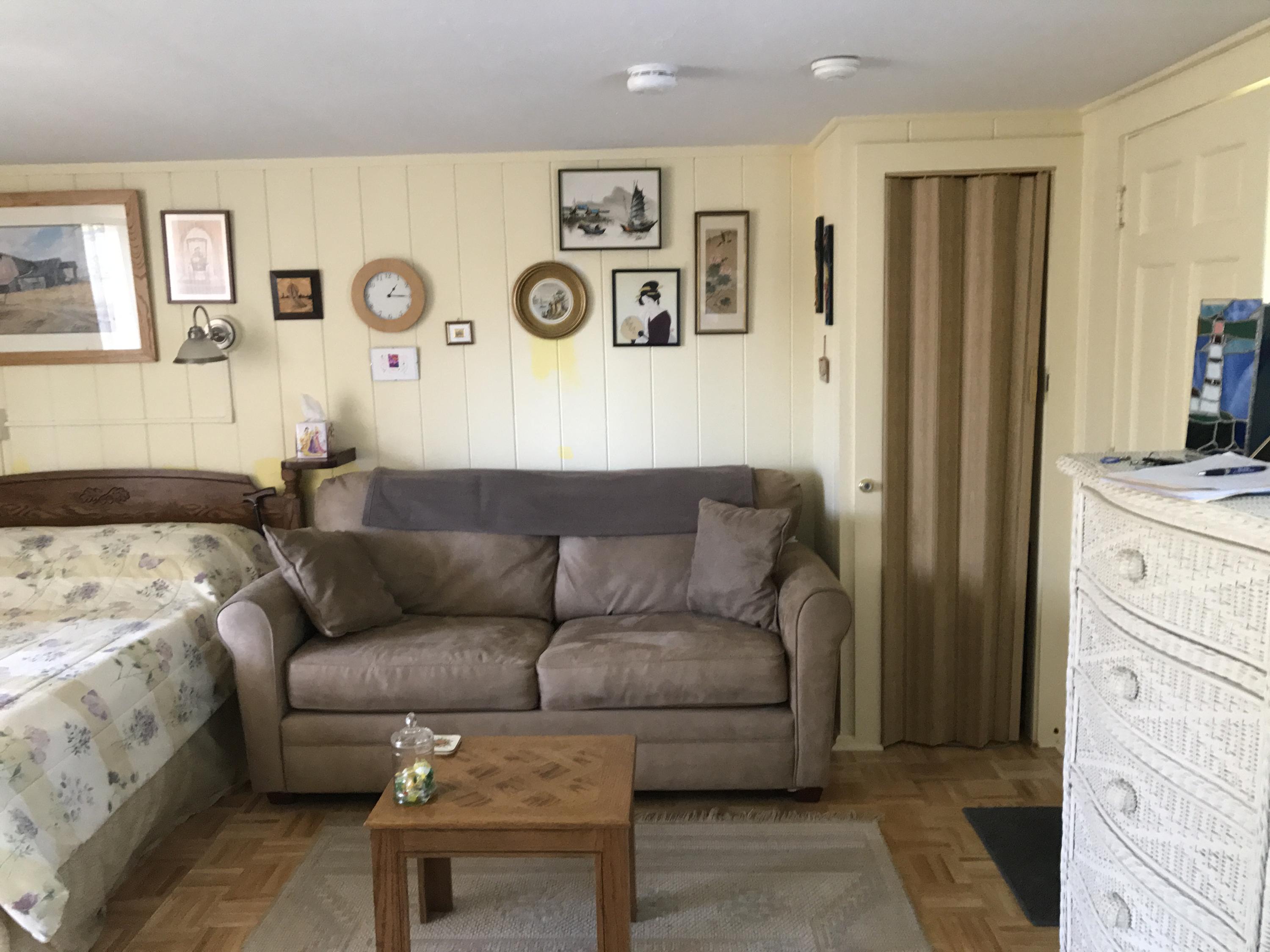 75 Beaten Road, Unit 14 Dennis Port, MA 02639 - Photo 4 of 11 a living room with furniture and a window