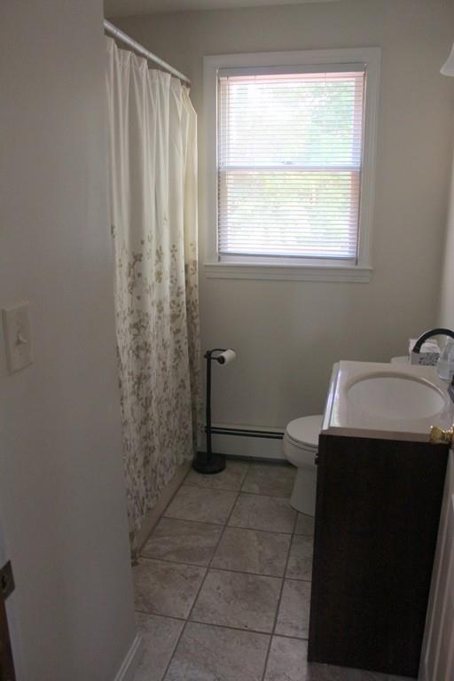 68 Valley Road Dracut, MA 01826 - Photo 5 of 25 a bathroom with a sink toilet and window