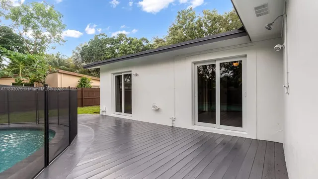 a view of livingroom with deck and outdoor space