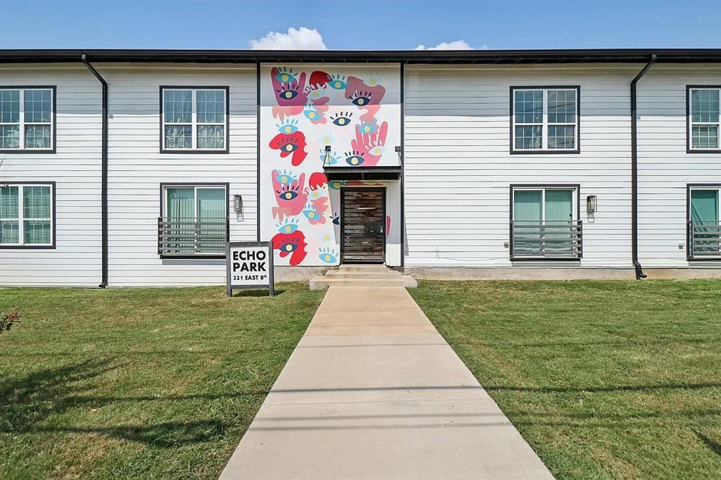 321 East 8th Street, Unit 104 Dallas, TX 75203 - Photo 12 of 15 a front view of a house