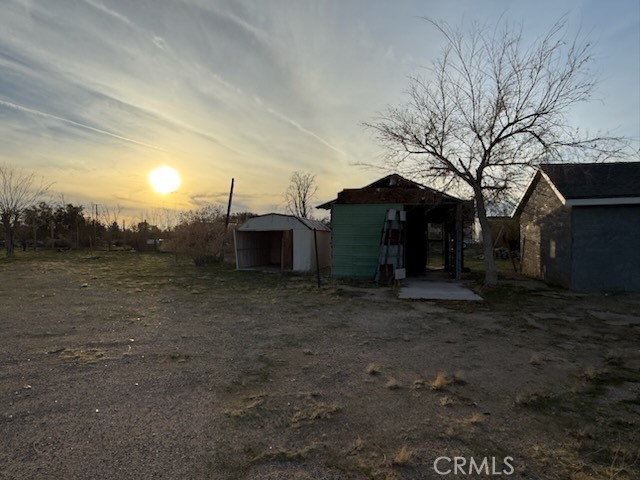 2503 Gerrymander Road Barstow, CA 92311 - Photo 13 of 13 a view of a house with a backyard
