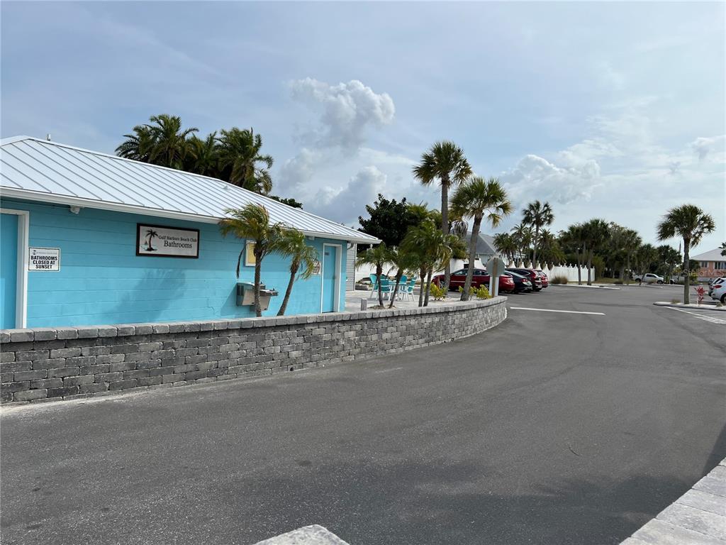 4854 Marine Parkway, Unit 103 New Port Richey, FL 34652 - Photo 12 of 21 a view of street along with road and trees