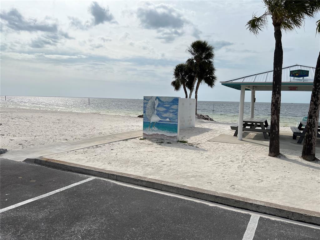 4854 Marine Parkway, Unit 103 New Port Richey, FL 34652 - Photo 14 of 21 an ocean view with beach