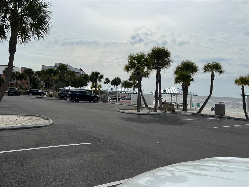 4854 Marine Parkway, Unit 103 New Port Richey, FL 34652 - Photo 21 of 21 a view of a street with a cars park