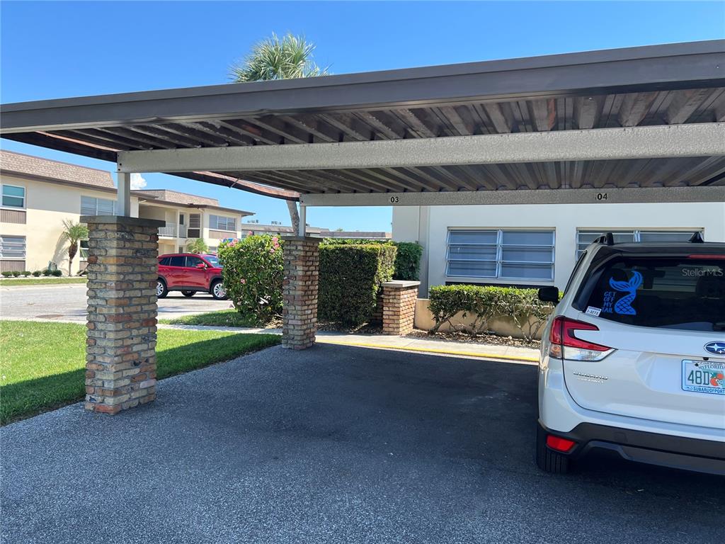 4854 Marine Parkway, Unit 103 New Port Richey, FL 34652 - Photo 3 of 21 a view of garage