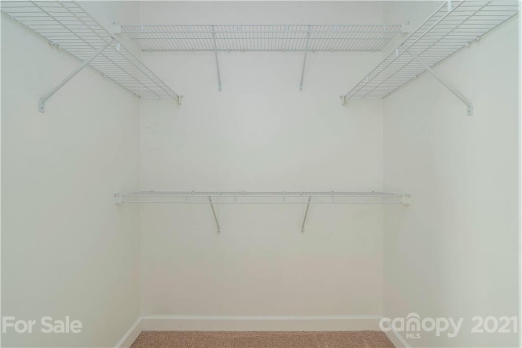 652 Old Meeting Way Davidson, NC 28036 - Photo 22 of 32 a view of small space with racks on the wall