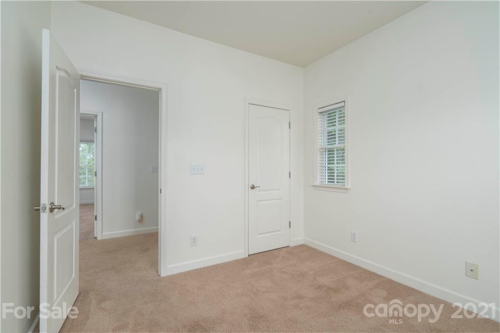 652 Old Meeting Way Davidson, NC 28036 - Photo 24 of 32 an empty room with windows