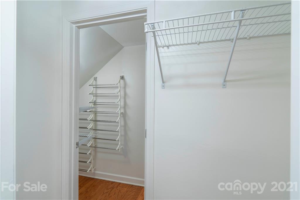 652 Old Meeting Way Davidson, NC 28036 - Photo 9 of 32 a view of walk in closet with empty racks