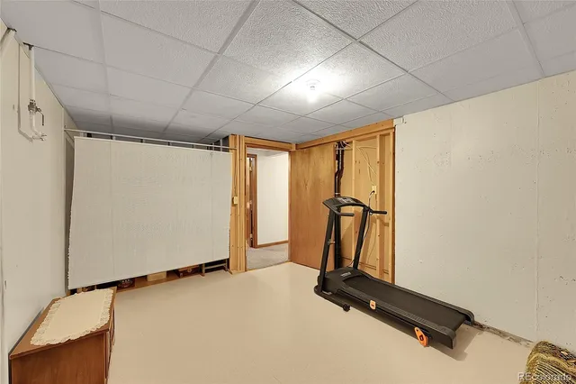 an aerial view of residential building and lake