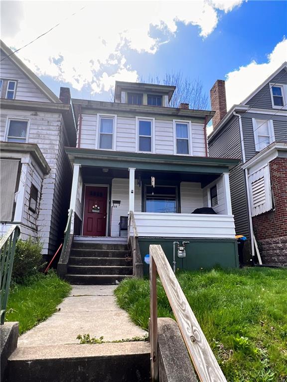 405 Grove Street McKees Rocks, PA 15136 - Photo 1 of 7 a view of a house with backyard and porch