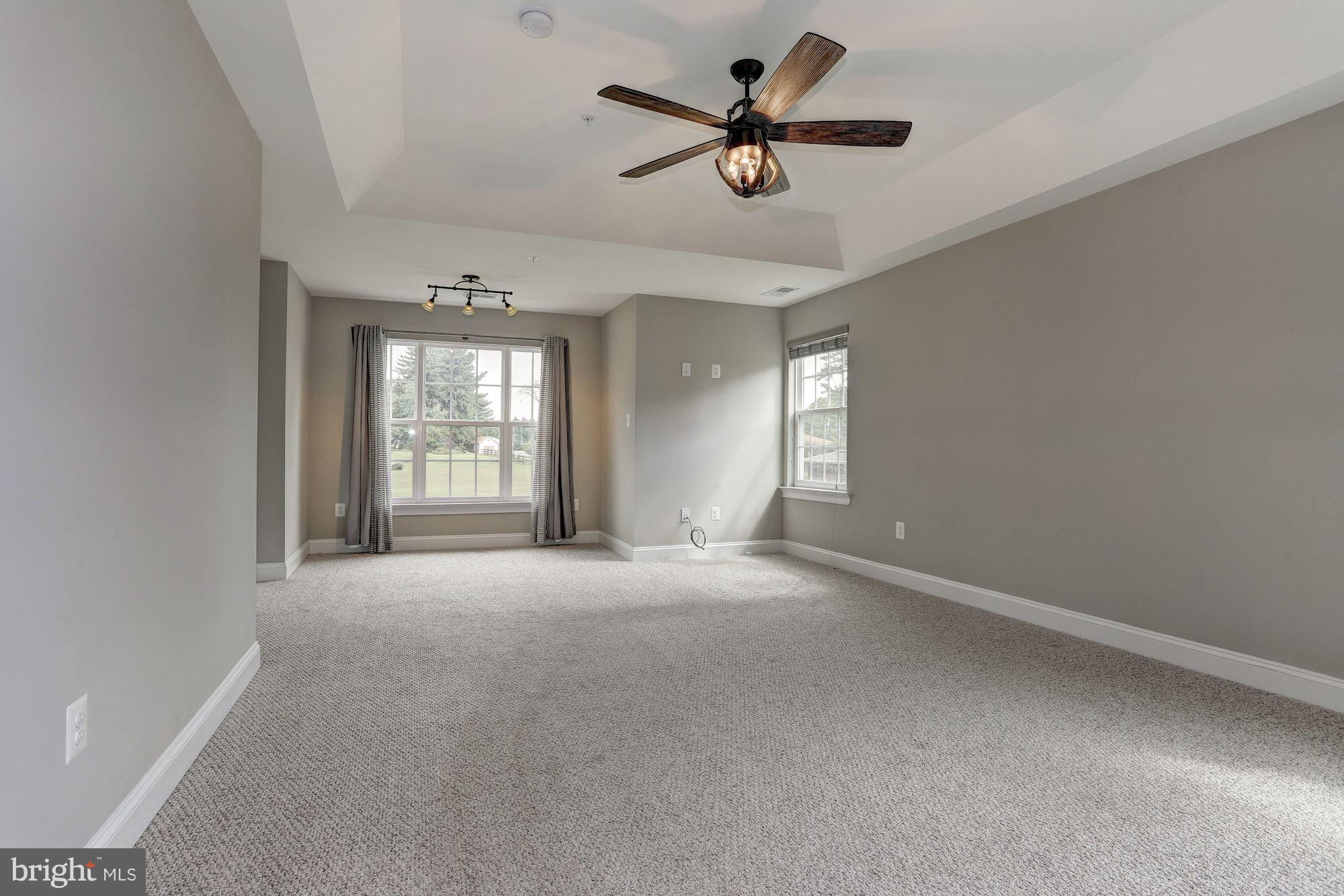 8420 High Ridge Road Ellicott City, MD 21043 - Photo 13 of 30 a view of an empty room with a window