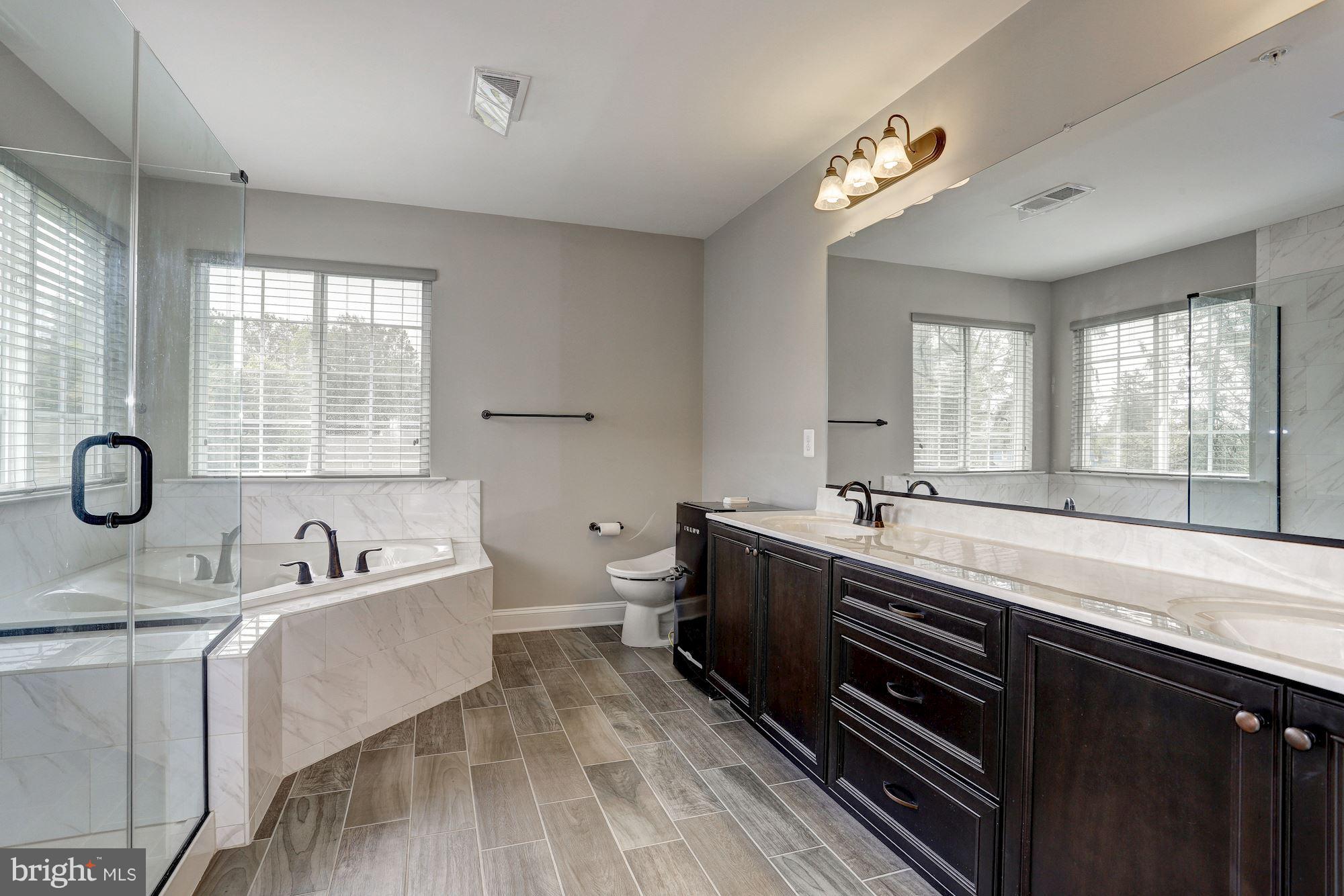 8420 High Ridge Road Ellicott City, MD 21043 - Photo 15 of 30 a large kitchen with a large window