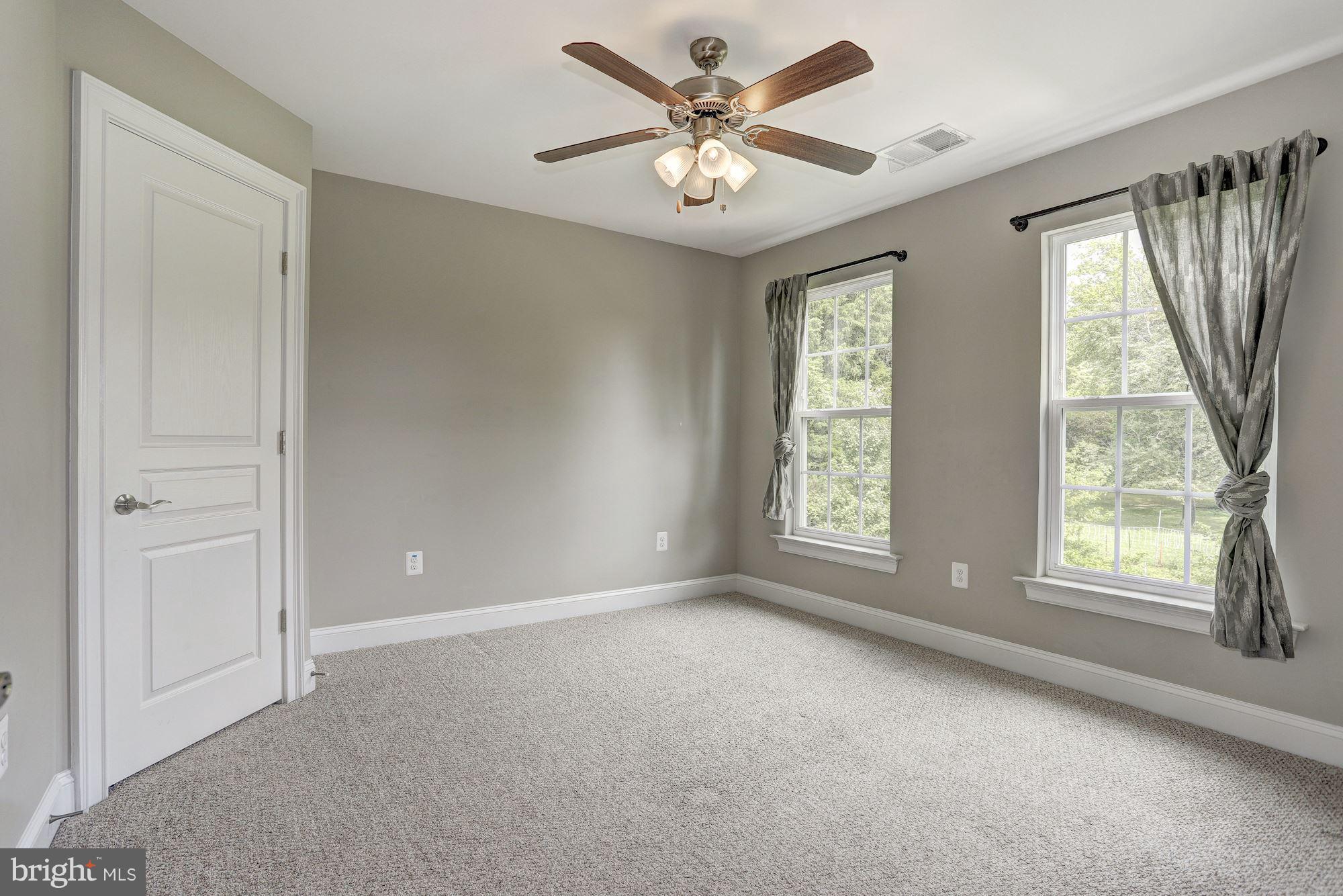 8420 High Ridge Road Ellicott City, MD 21043 - Photo 19 of 30 a view of an empty room with a window