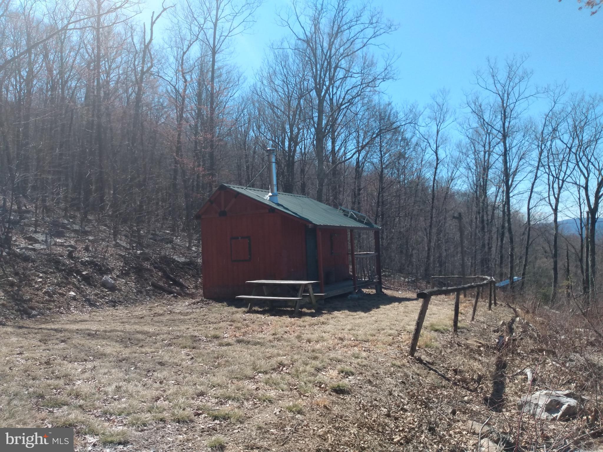 5 Kessel Road Great Cacapon, WV 25422 - Photo 3 of 22 a backyard of a house