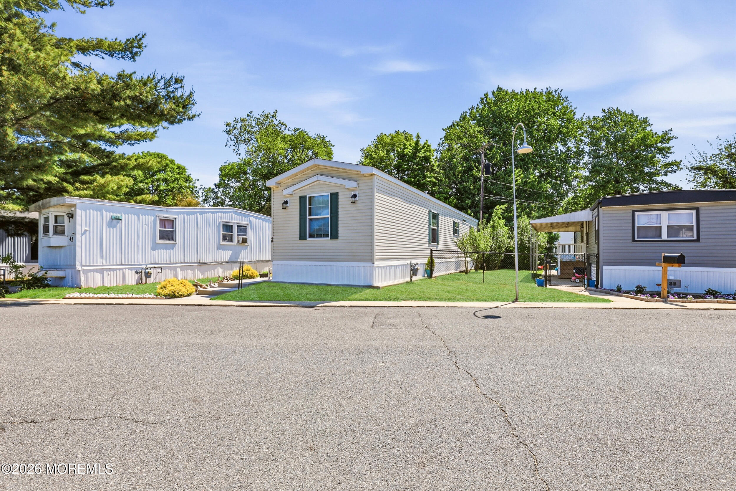 40 Locust Grove Hazlet, NJ 07730 - Photo 3 of 15 a view of a house with a swimming pool and a yard