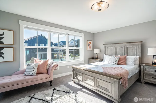 a bed room with a bed and a couch