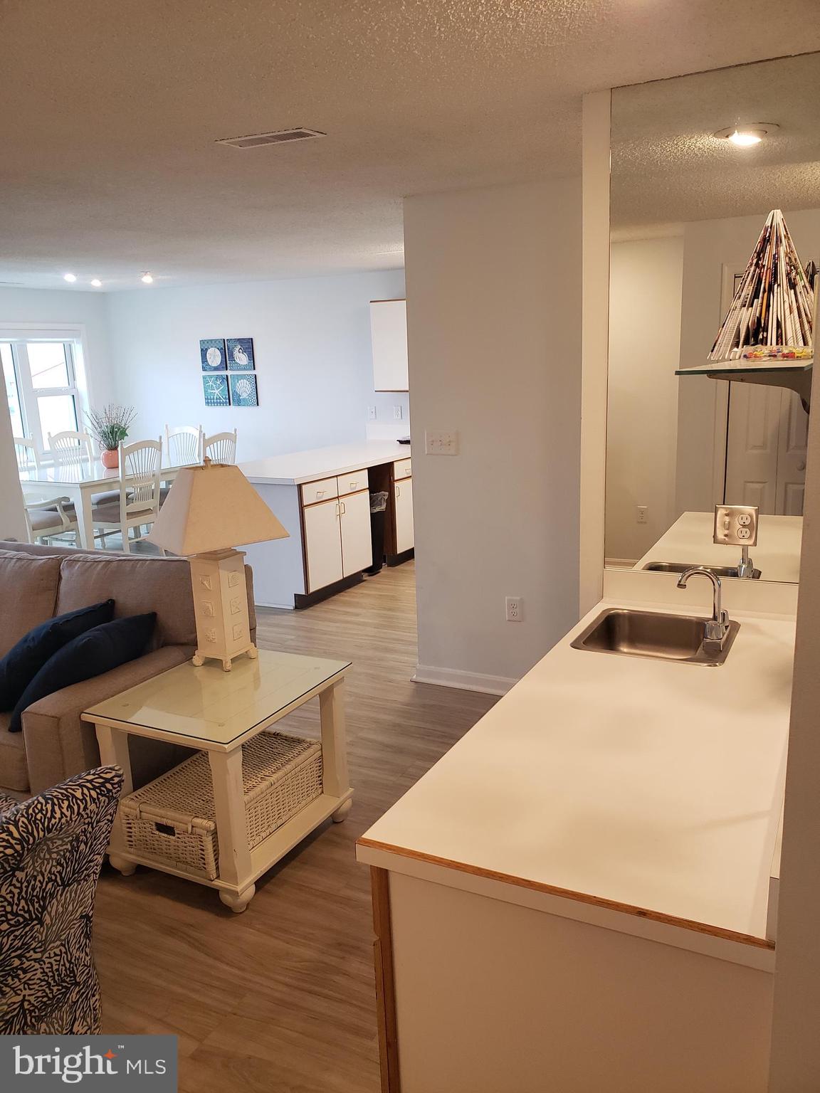 12108 Coastal Highway, Unit 404 Ocean City, MD 21842 - Photo 23 of 31 wetbar /Living room