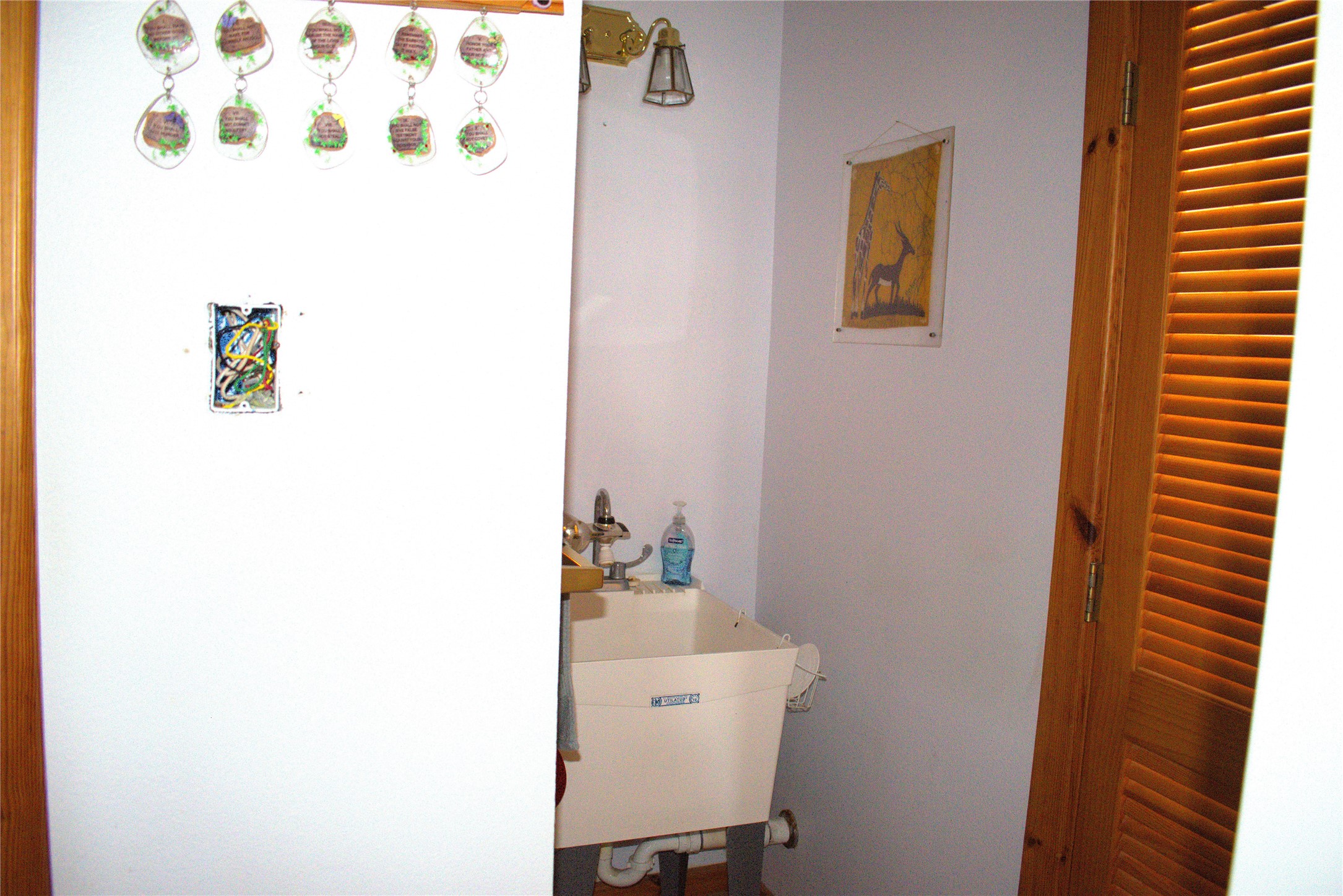 1657 County Road Sargent, TX 77414 - Photo 36 of 46 a bathroom with a sink and a mirror