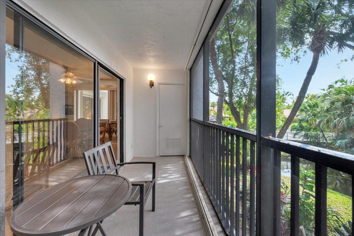 1605 Highway 1, Unit E201 Jupiter, FL 33477 - Photo 16 of 19 a view of a balcony with furniture