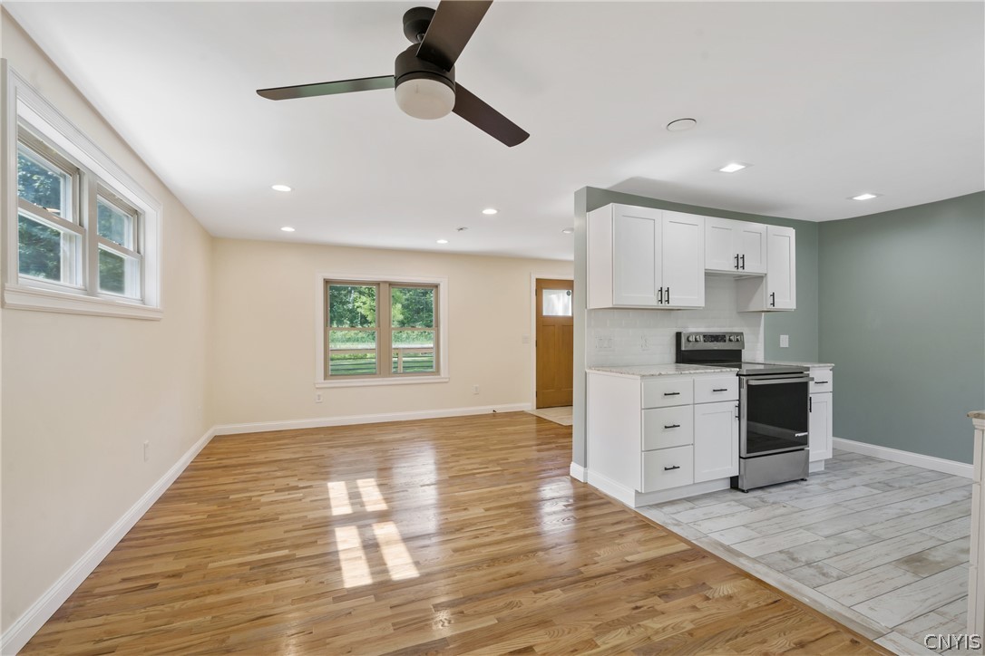 563 County Rte 12 Schroeppel, NY 13132 - Photo 9 of 39 And we can see more of that breathtaking porcelain tile at the floor of this all NEW kitchen...