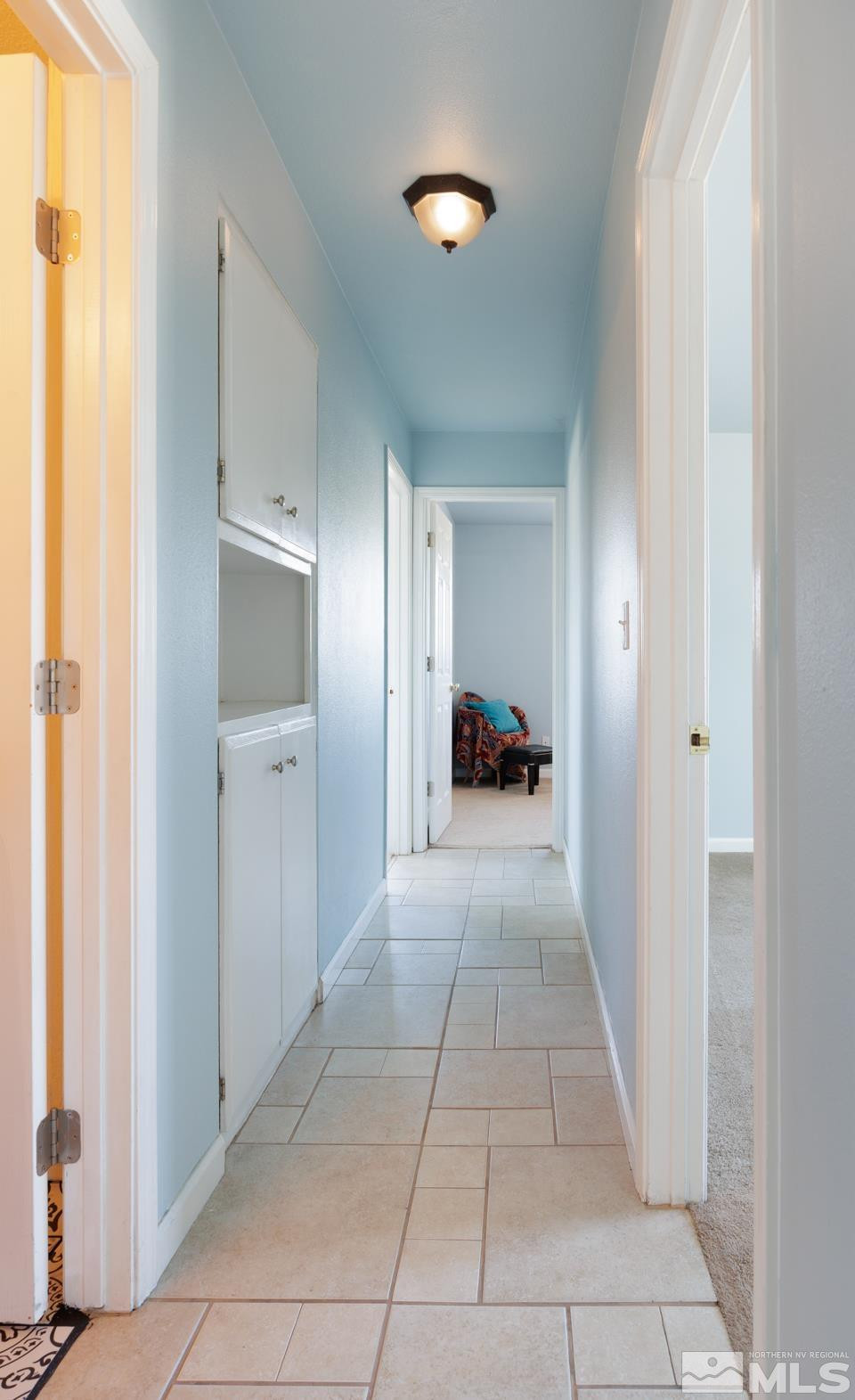 777 Rice Road Fallon, NV 89406 - Photo 11 of 24 a view of a hallway and a livingroom with furniture