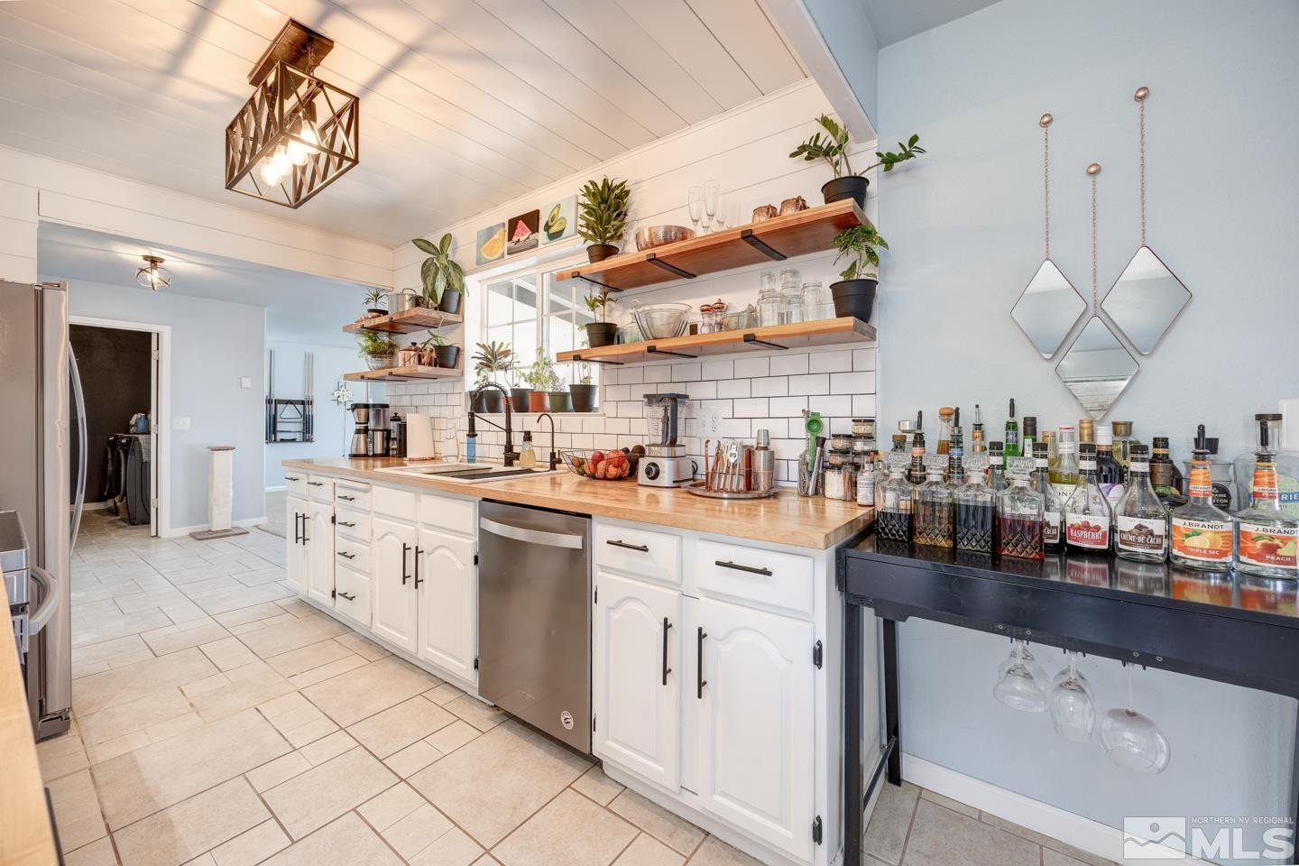 777 Rice Road Fallon, NV 89406 - Photo 8 of 24 a kitchen with cabinets and window