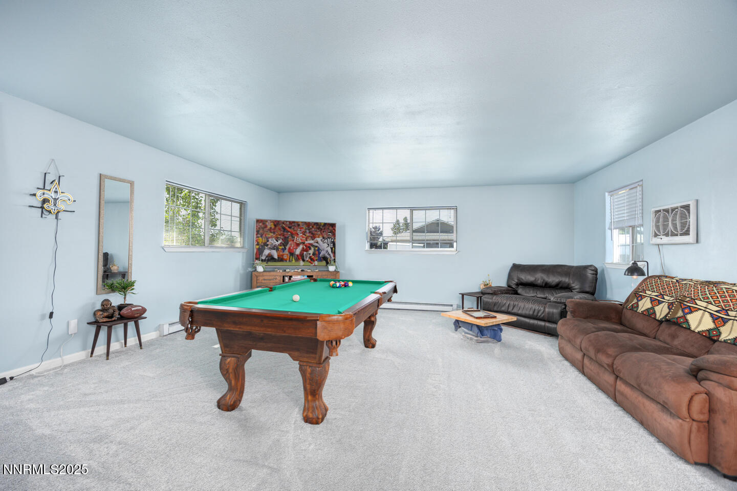777 Rice Road Fallon, NV 89406 - Photo 10 of 24 a living room with furniture gym equipment and a window