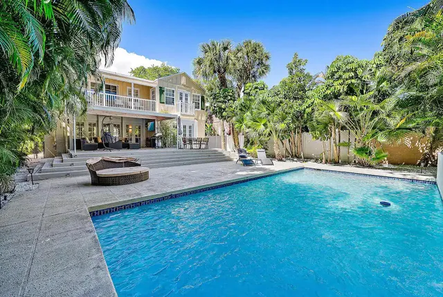 a swimming pool view with a outdoor space