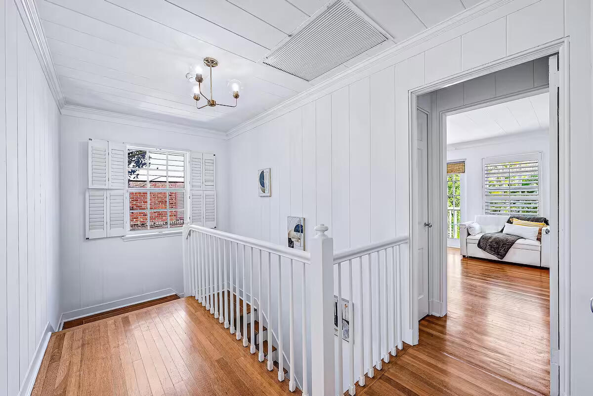 4110 Washington Road West Palm Beach, FL 33405 - Photo 17 of 38 a view of a hallway view with wooden floor and staircase