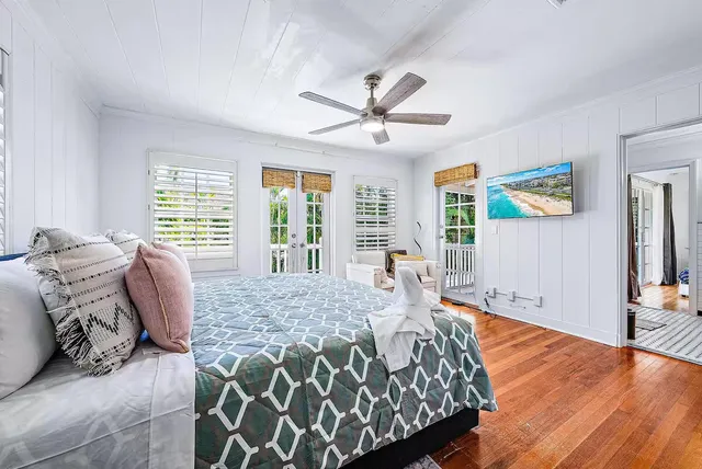 a bathroom with a toilet a sink and a mirror
