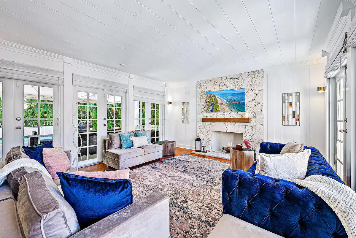 4110 Washington Road West Palm Beach, FL 33405 - Photo 8 of 38 a living room with furniture and large windows