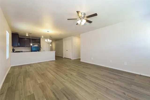 a view of a kitchen with a dishwasher and cabinets
