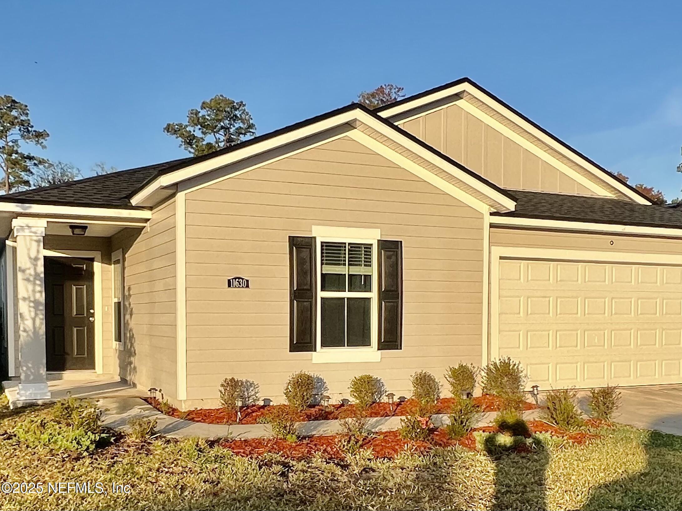 11630 Palladio Way Jacksonville, FL 32218 - Photo 2 of 23 a front view of a house