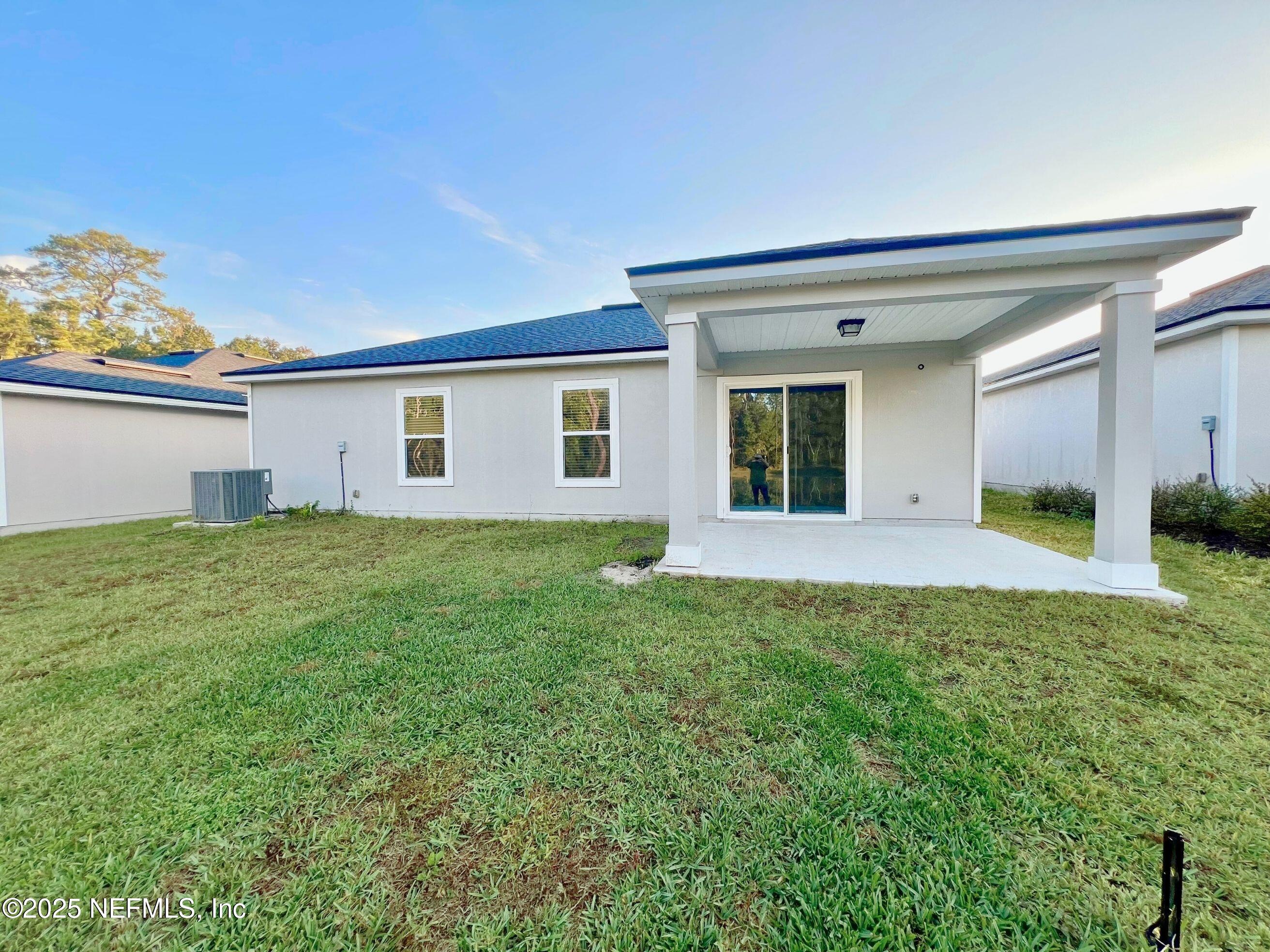 11630 Palladio Way Jacksonville, FL 32218 - Photo 21 of 23 a view of an house with backyard space and balcony