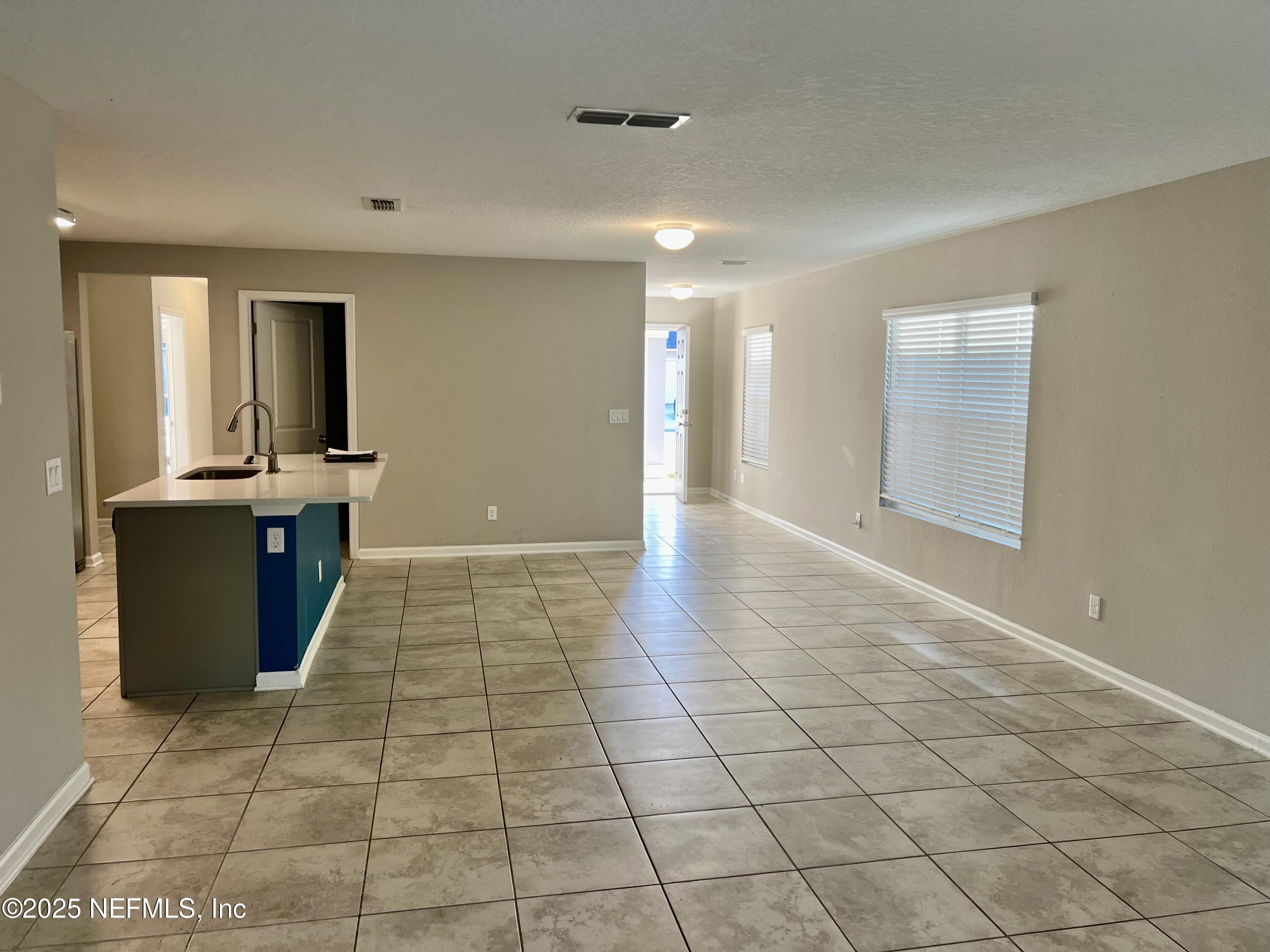 11630 Palladio Way Jacksonville, FL 32218 - Photo 8 of 23 a view of a kitchen with a sink